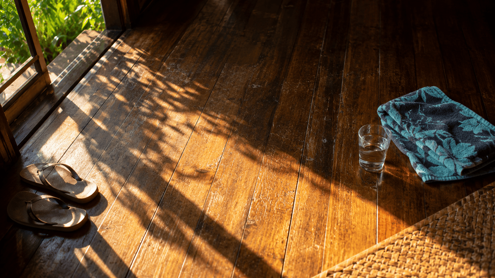 A clear area of firm flooring with a pair of flat shoes set aside, ready for a movement test